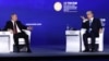 RUSSIA – Russia's President Vladimir Putin (L) and Kazakhstan's President Kassym-Jomart Tokayev attend a plenary session at the 2022 St Petersburg International Economic Forum, June 17, 2022