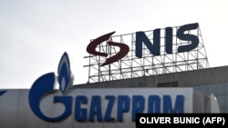Signs at the Belgrade headquarters of Naftna Industrija Srbije AD (NIS), and the company's owner OAO Gazprom Neft.