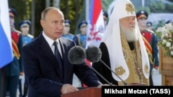 Рускиот претседател Владимир Путин и патријархот Кирил (архивска фотографија)